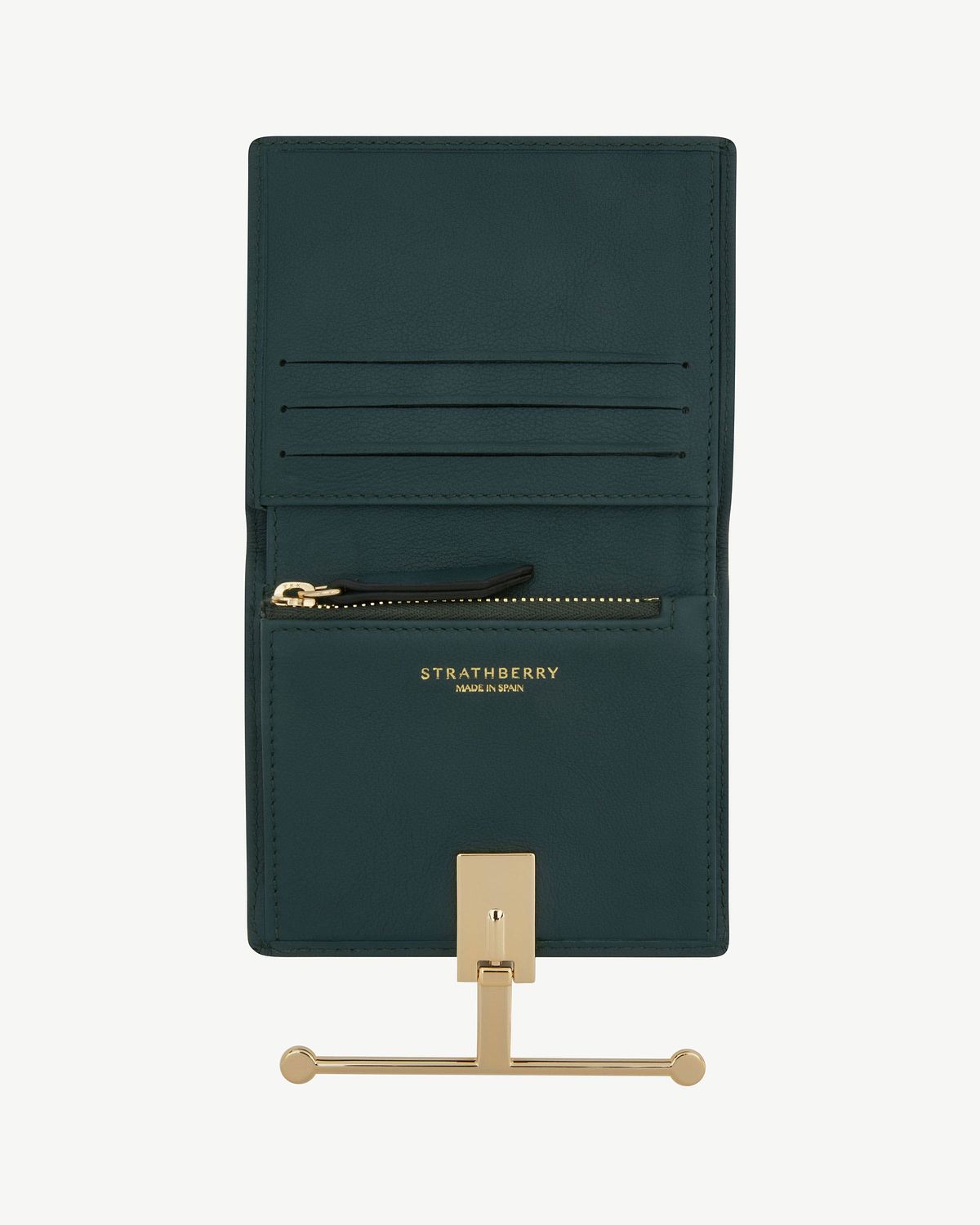 Bottle green Melville Street wallet open, Strathberry logo and gold clasp visible.