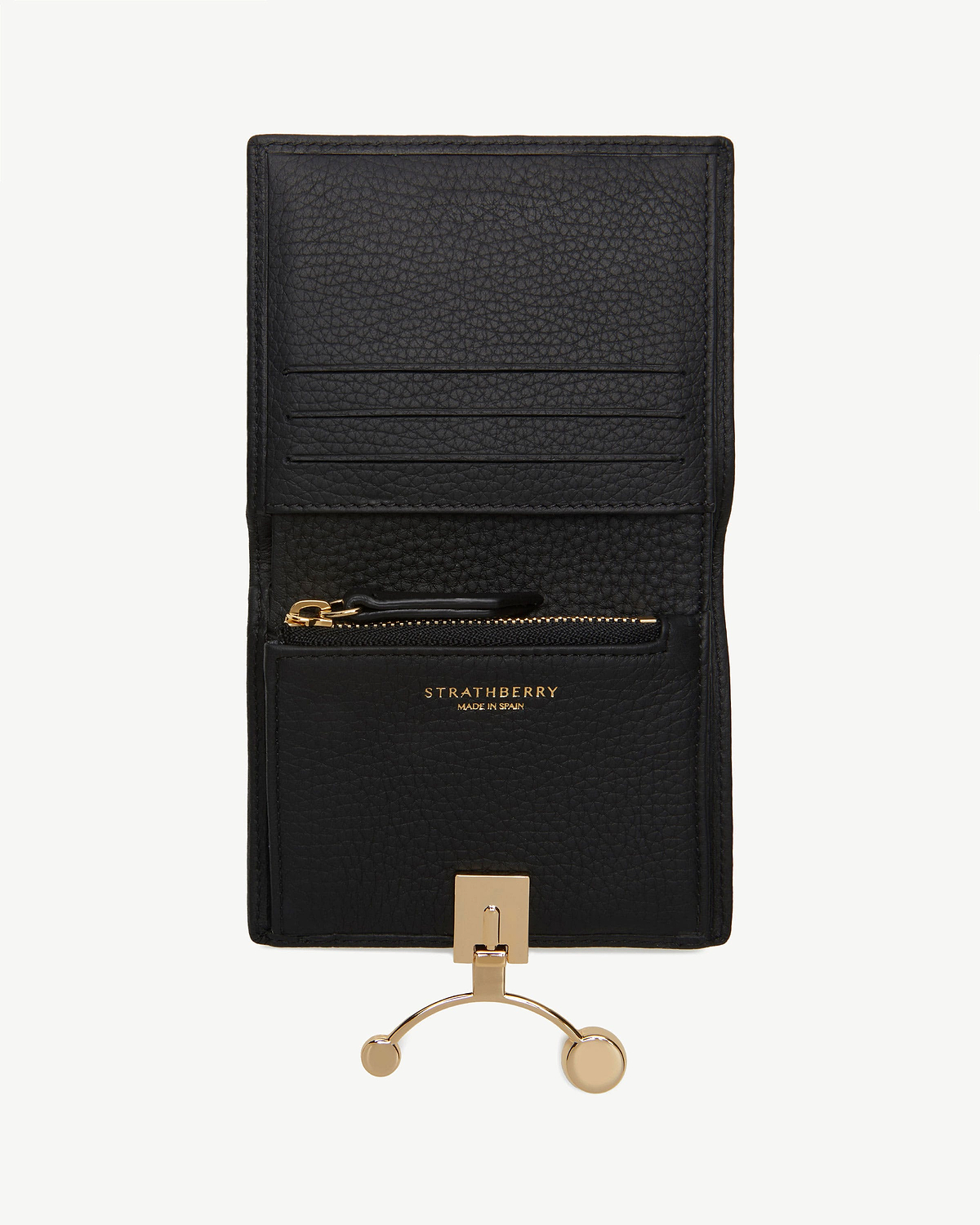 Black Strathberry crescent wallet open with card slots, zip pocket, gold hardware.