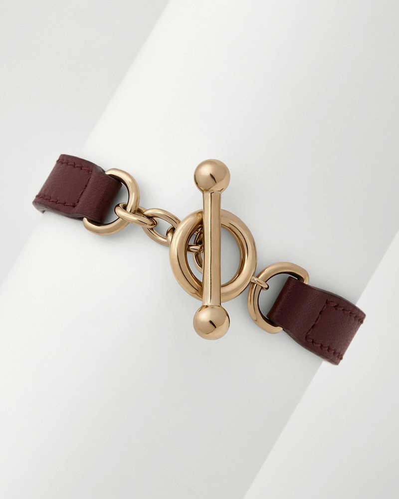 Oxblood leather kite bracelet with gold-tone toggle clasp and link rings