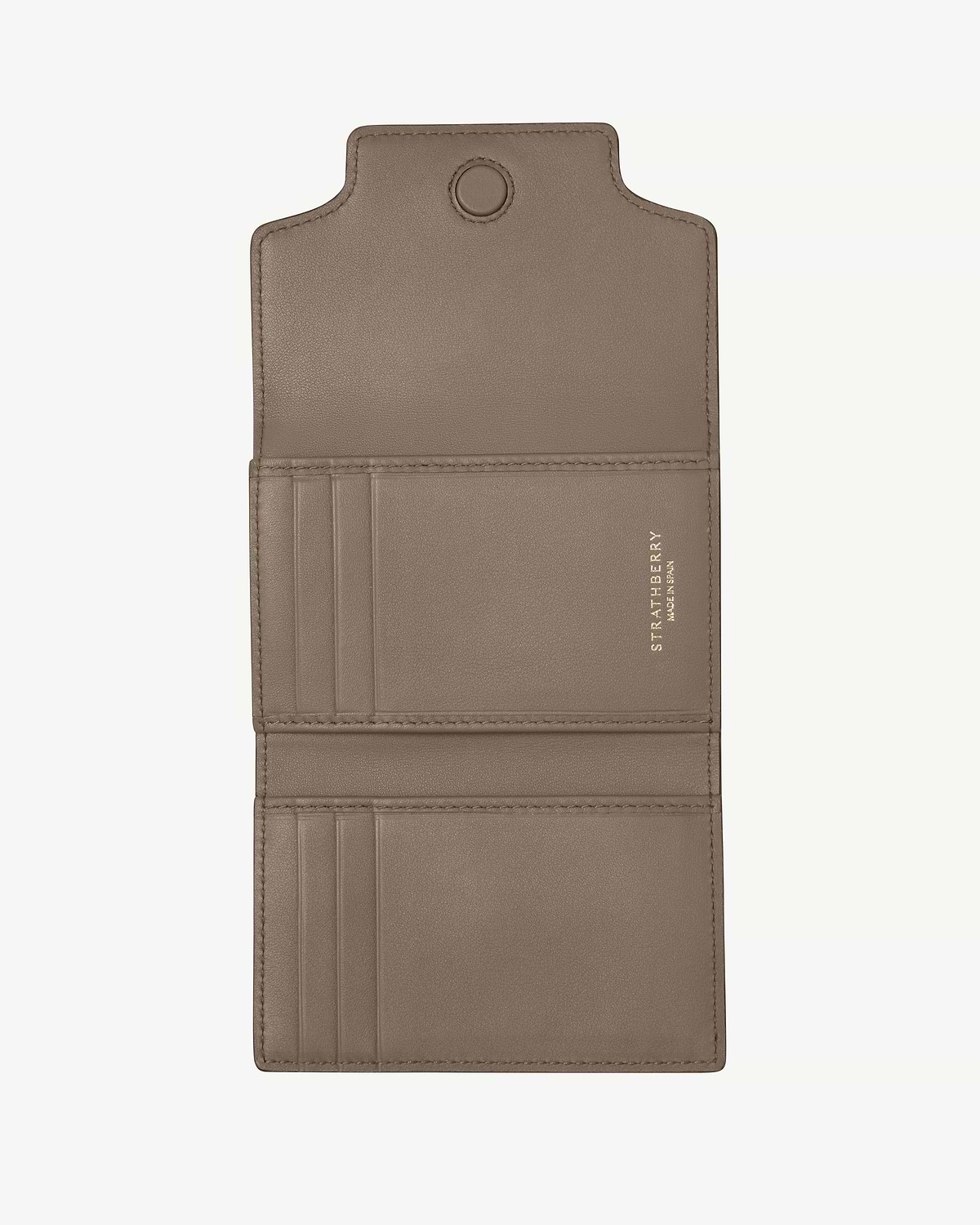 Taupe Strathberry Multrees trifold wallet open, showing card slots and compartments.