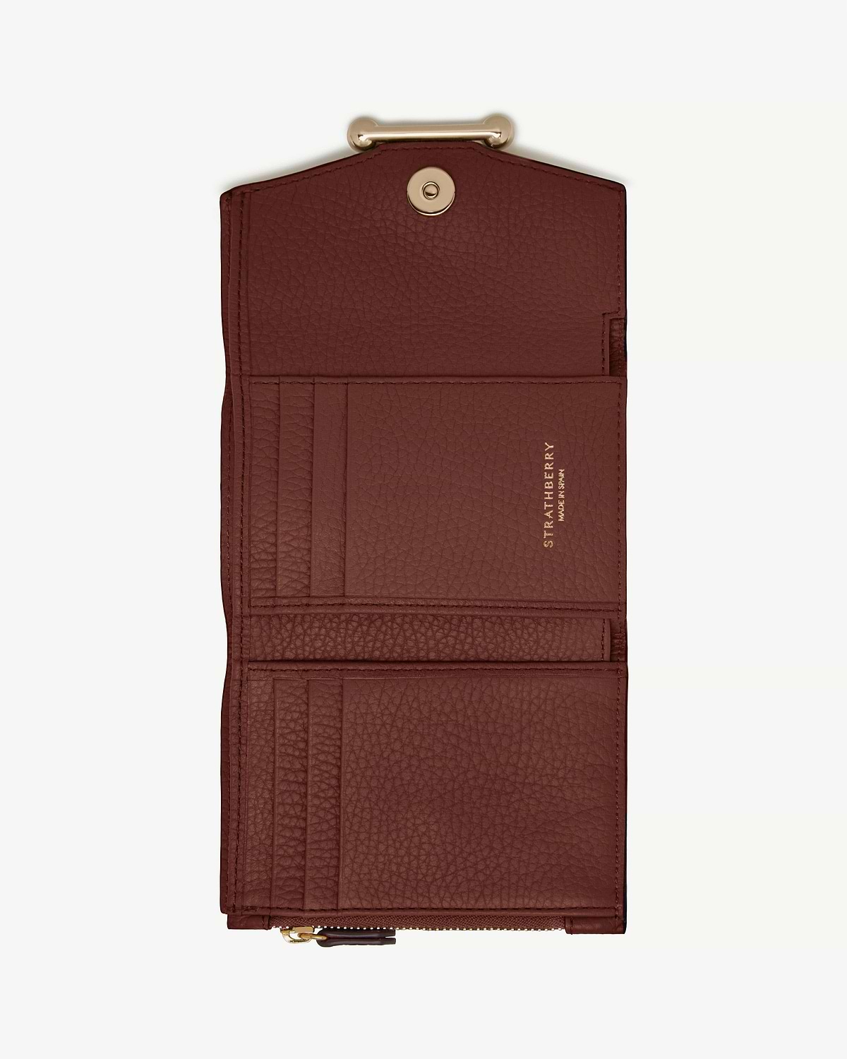 Open Strathberry mosaic trifold wallet in walnut showing card slots and snap.