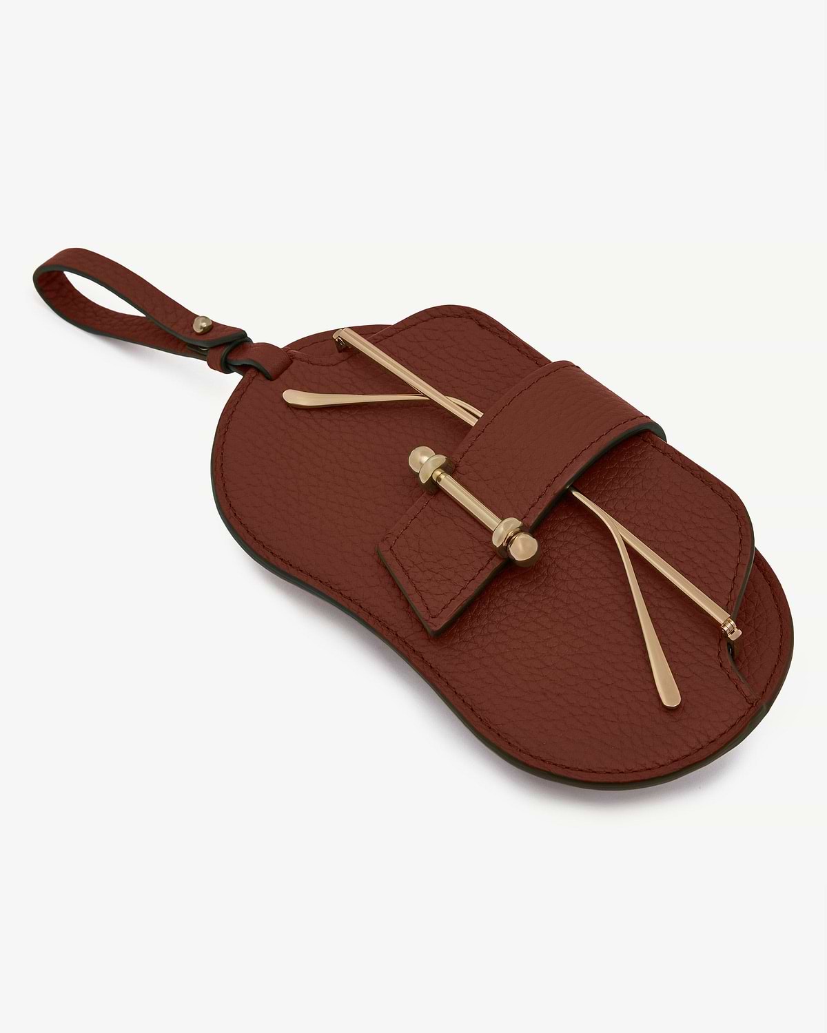 Walnut pebbled leather sunglasses case with gold-toned hardware and wrist strap.