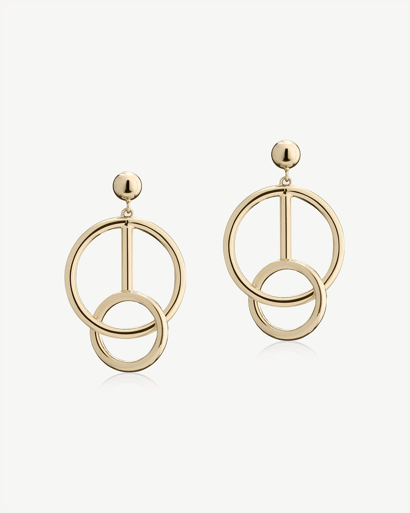 Pair of 22-carat gold-gilded Music Bar hoop earrings on white background.
