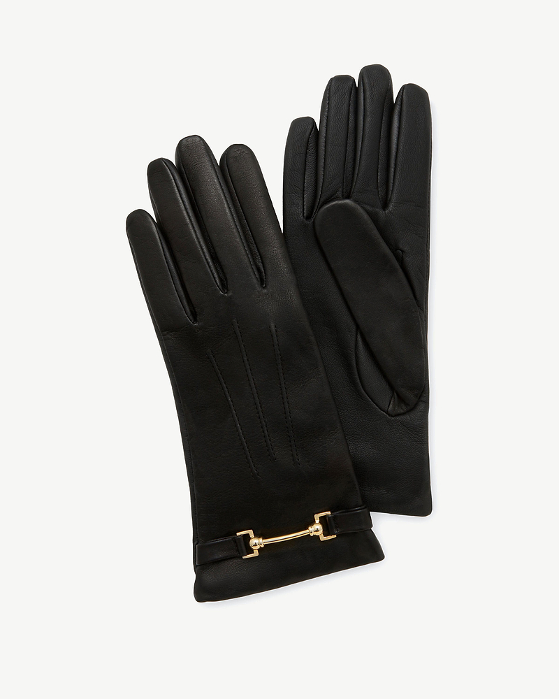 Black leather gloves with gold horsebit strap detail and three stitched finger lines.