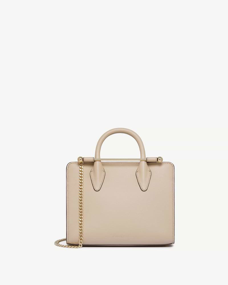 Strathberry mini tote in oat with top handles and gold chain strap