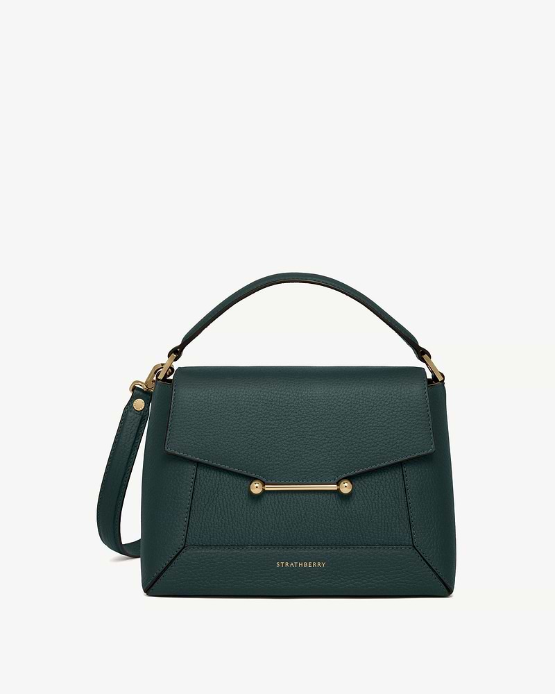 Bottle green Strathberry mosaic bag with top handle and gold bar detail.