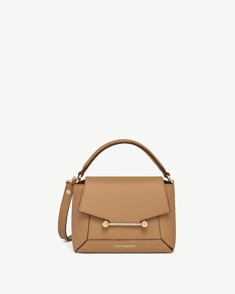 Caramel Mosaic Nano top handle bag with gold bar closure and Strathberry logo.