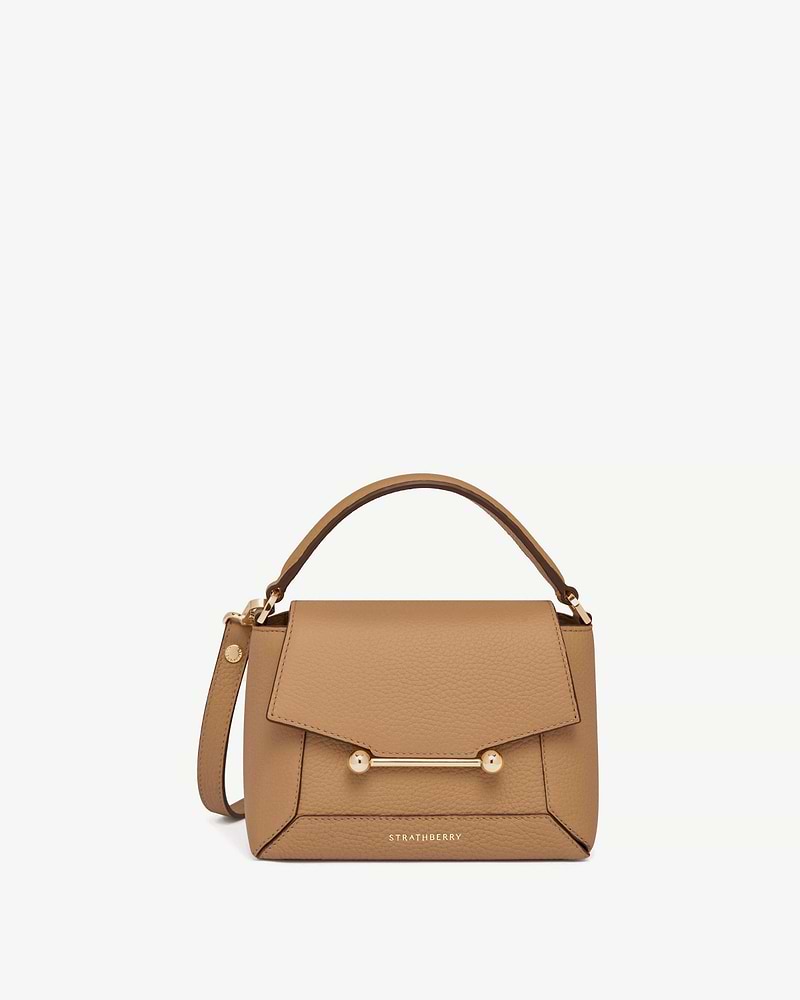 Caramel Mosaic Nano top handle bag with gold bar closure and Strathberry logo.