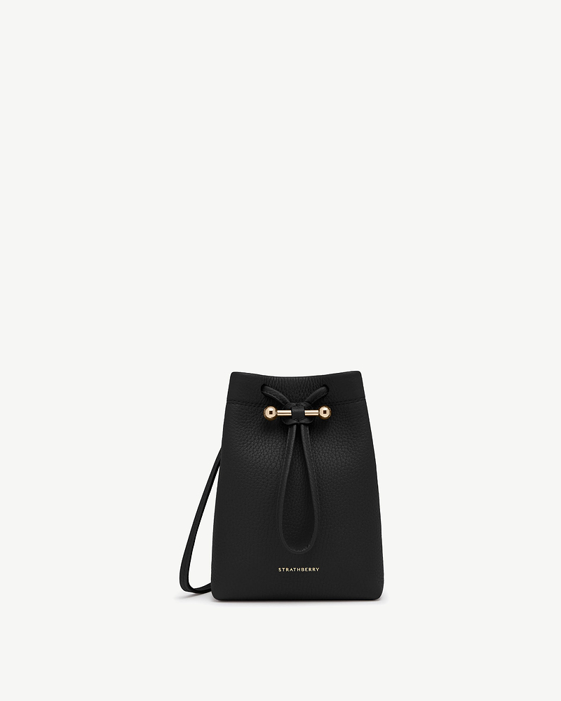 Black Strathberry Osette midi pouch with drawstring fastening and gold hardware.