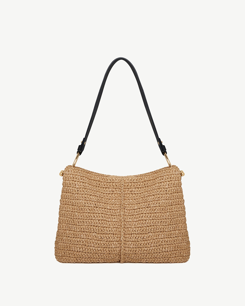 Raffia hobo bag with black shoulder strap and gold fittings