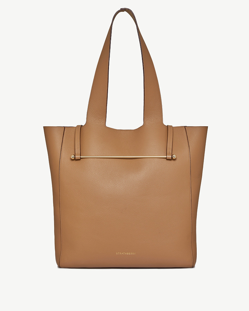 Caramel leather tote bag with gold bar detail and Strathberry logo
