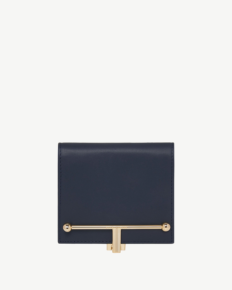 Marine blue Melville Street wallet with gold horizontal bar and T-shaped clasp.