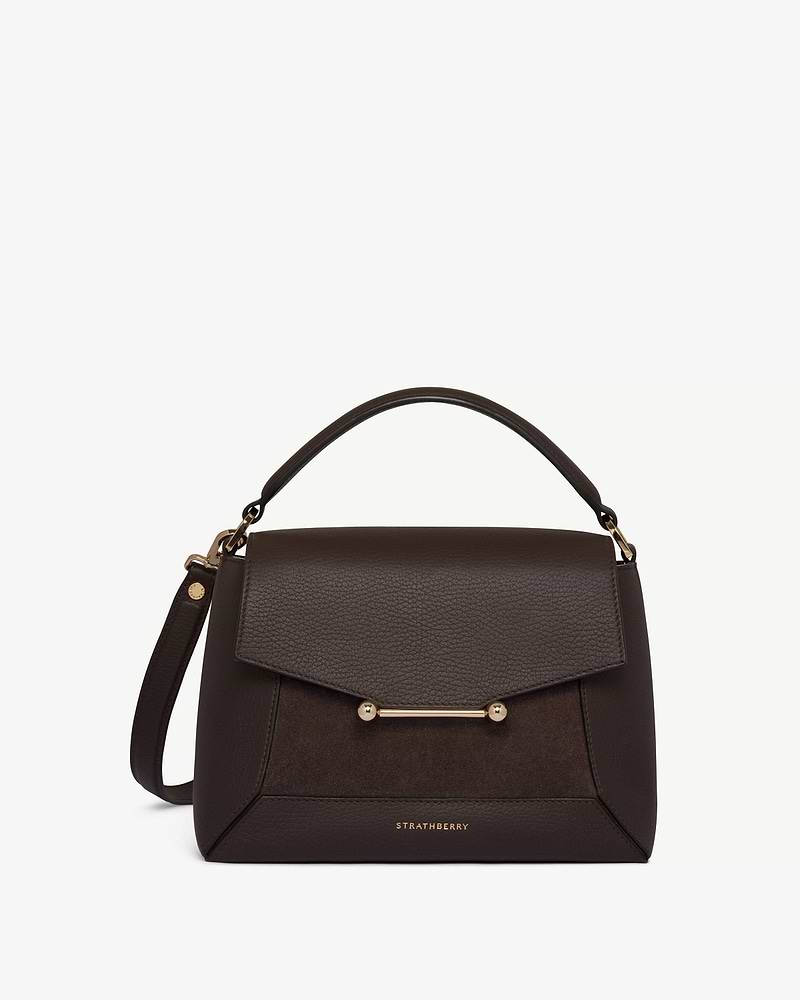 Strathberry Mosaic Bag in dark chocolate suede and leather with top handle, gold bar closure.