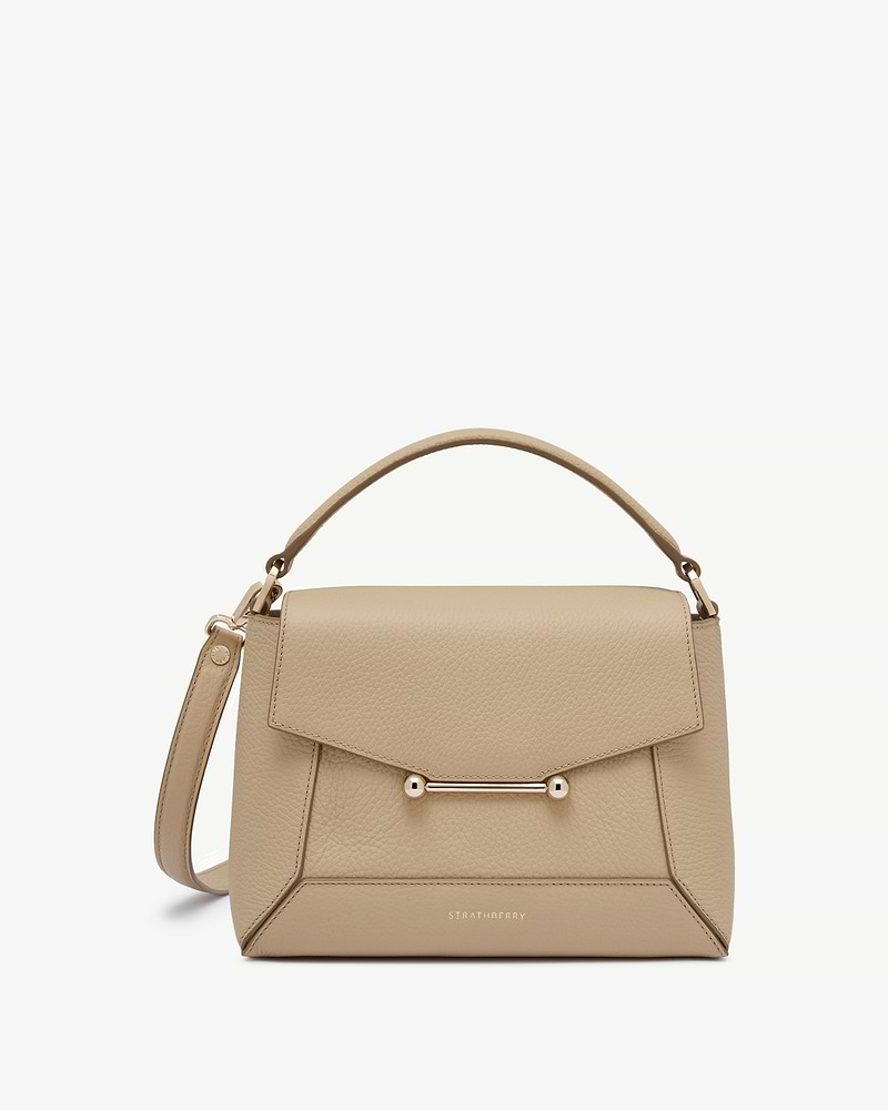 Sand leather mosaic bag with top handle, detachable strap and gold bar hardware, Strathberry.