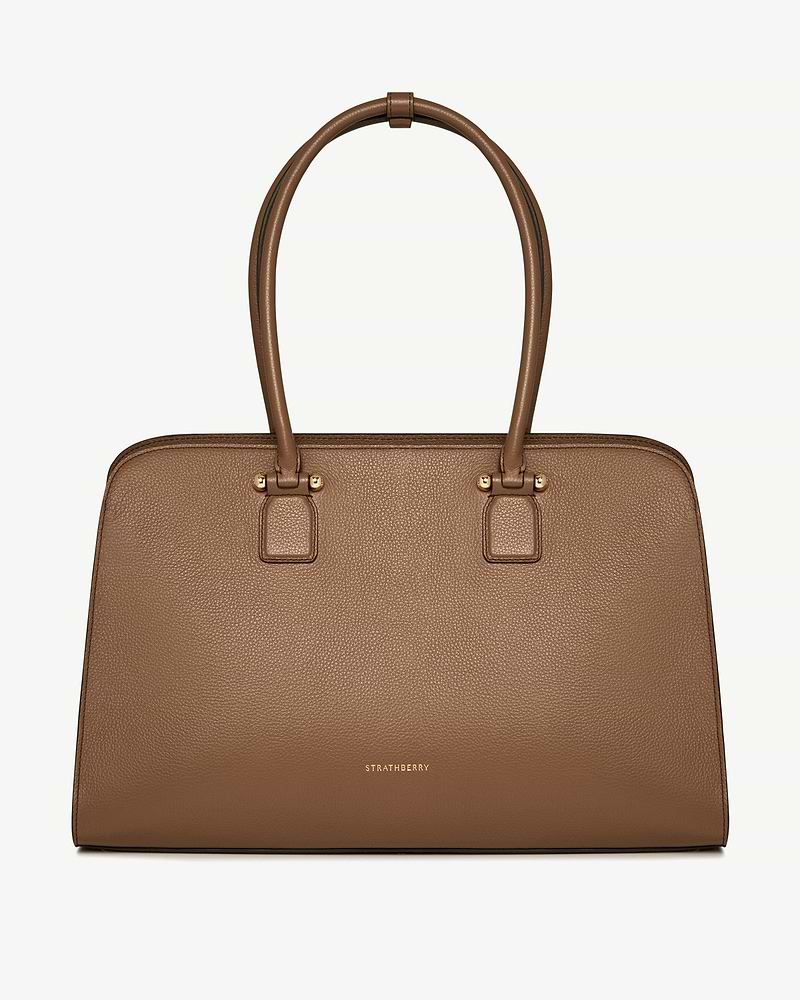Clay Strathberry Georgia Maxi leather tote bag with double top handles and gold hardware.