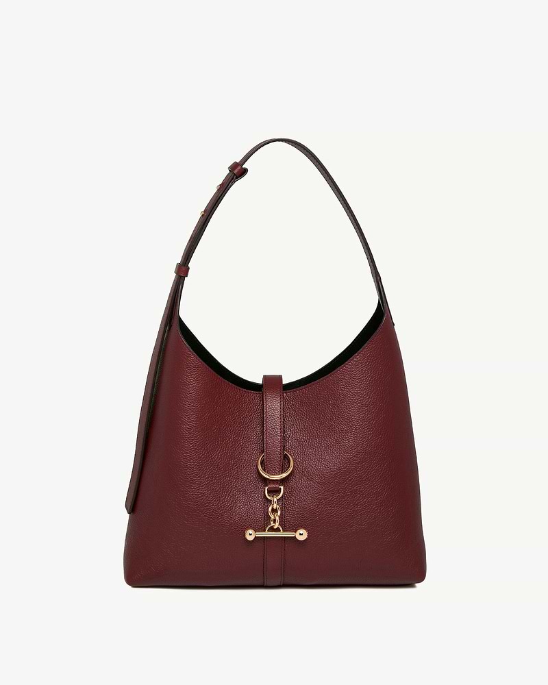 Oxblood leather kite hobo bag with single shoulder strap and gold hardware.