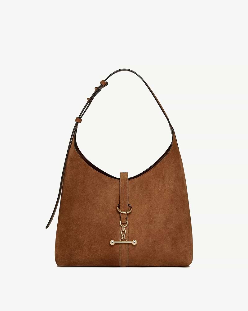 Tan suede Kite hobo bag with shoulder strap and gold ring hardware.