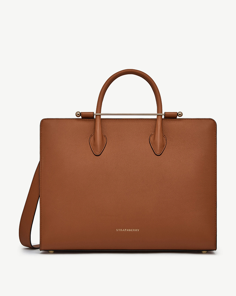Chestnut leather tote with top handles, metal bar detail and Strathberry logo.