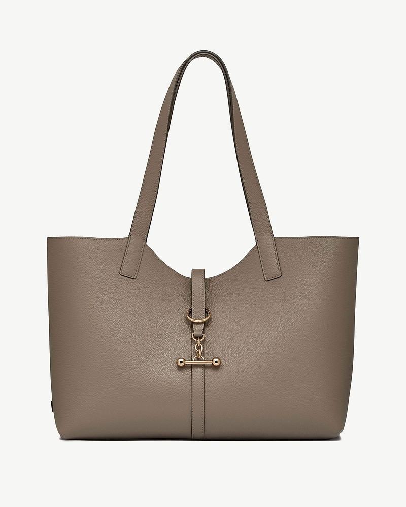 Taupe leather kite tote with long straps and gold T-bar clasp detail.