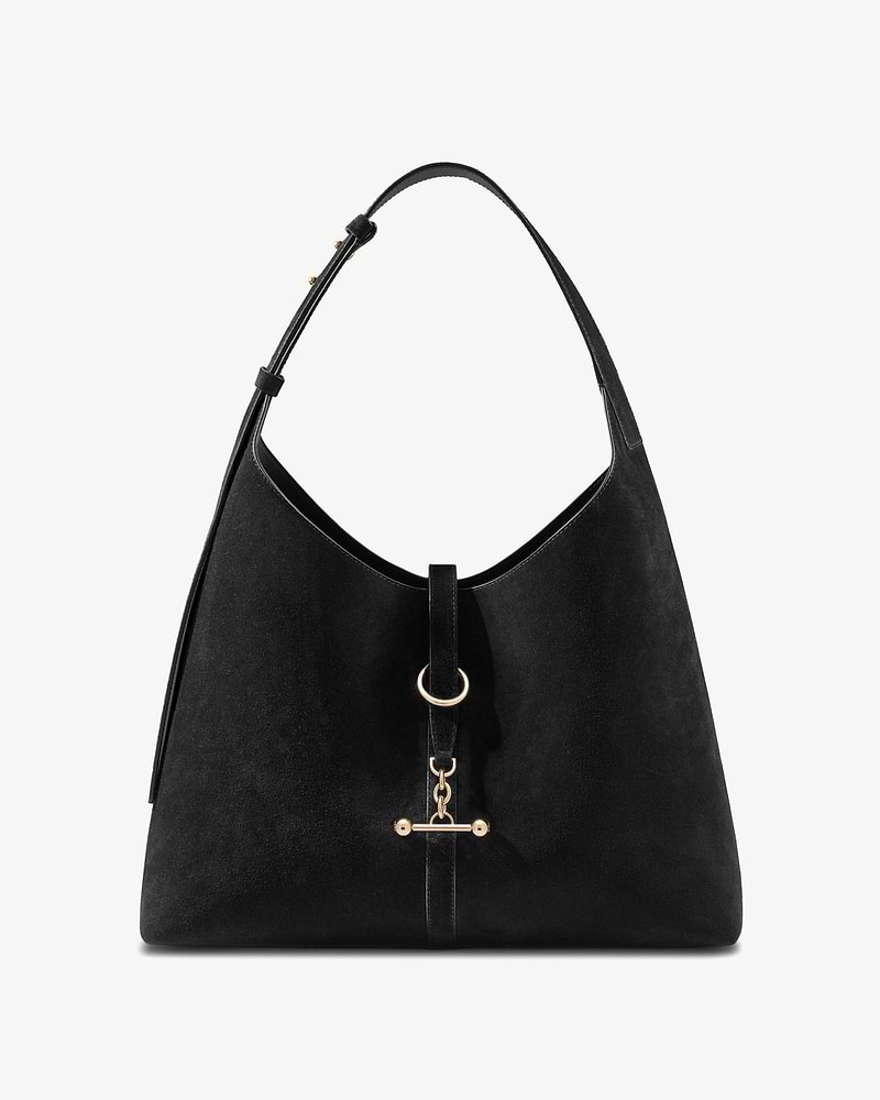 Black suede hobo bag with gold ring and chain toggle closure, single shoulder strap.