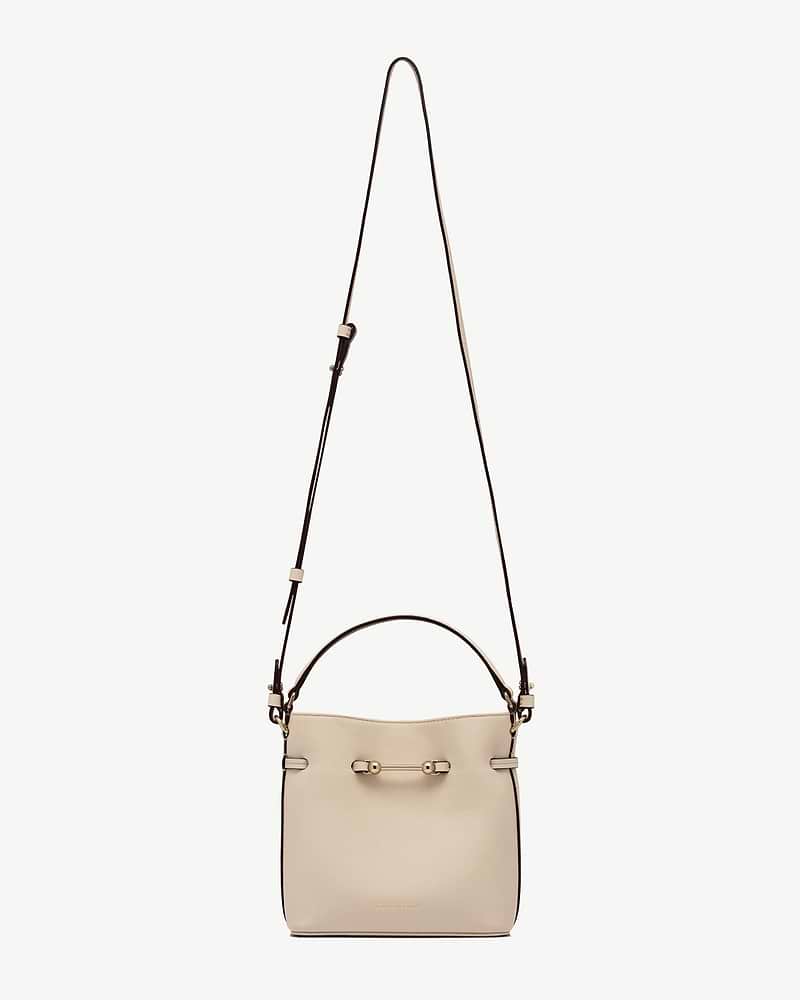 Oat mini bucket bag with long strap, top handle and gold bar detail