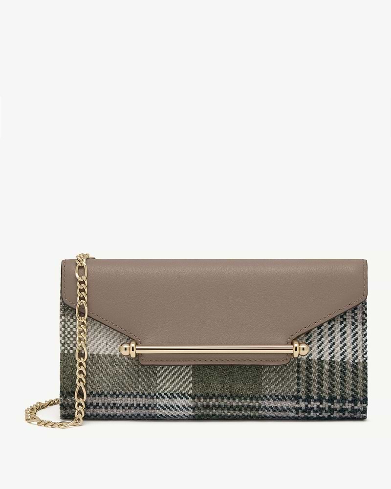Tartan fabric chain wallet with taupe leather flap and gold bar hardware.
