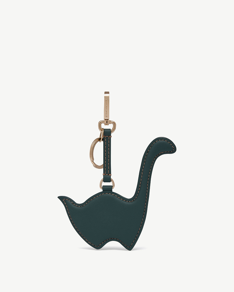 Bottle green Nessie shaped leather bag charm with gold Strathberry hardware
