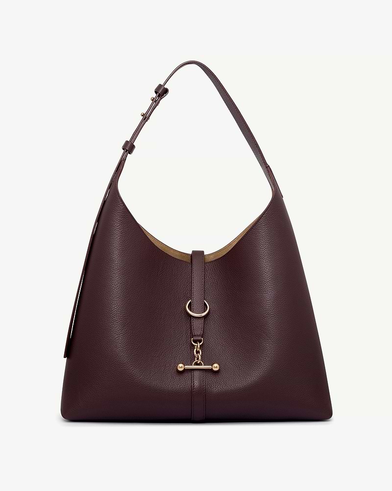 Burgundy pebbled leather hobo bag with single shoulder strap and gold hardware.