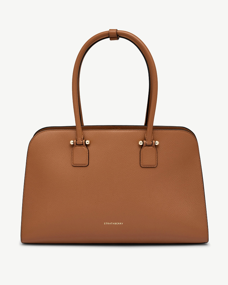 Tan Georgia Maxi leather tote with double top handles and gold Strathberry logo.