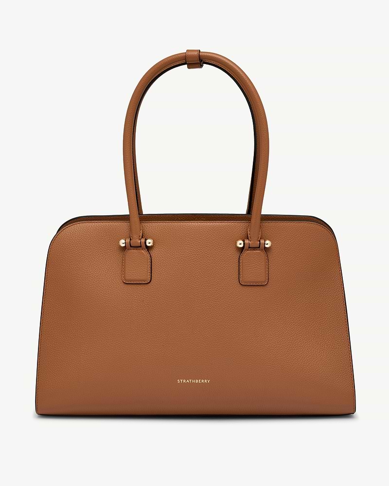 Tan Georgia Maxi leather tote with double top handles and gold Strathberry logo.