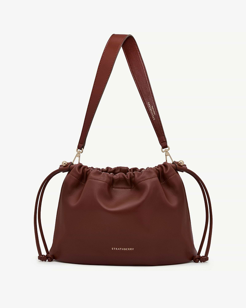 Strathberry Charlotte midi drawstring bag in walnut with leather shoulder strap