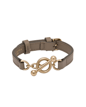 Taupe leather Kite bracelet with gold toggle bar and ring clasp.