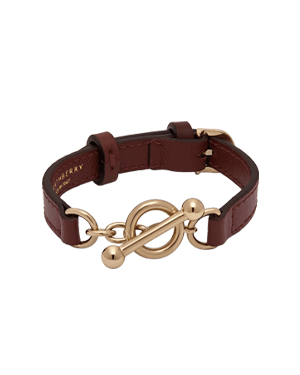 Oxblood leather bracelet with gold toggle bar and ring fastening.