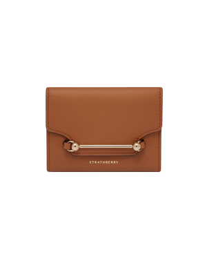 Chestnut Multrees trifold wallet with gold bar hardware and Strathberry logo.