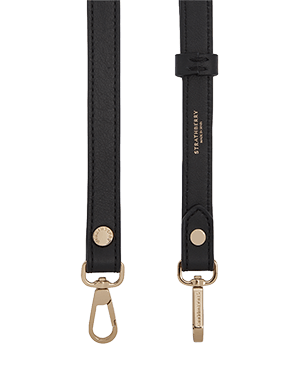 Thin adjustable black leather strap with gold hardware and Strathberry engraved tag.