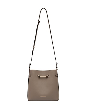 Taupe Corda bucket bag with adjustable shoulder strap and gold bar detail.