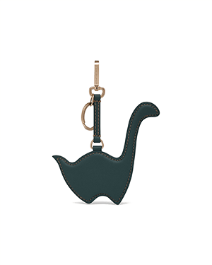Bottle green Nessie-shaped bag charm with gold-tone clasp and keyring.