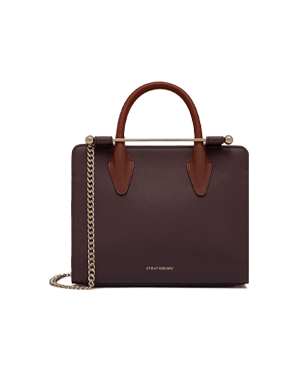 Strathberry burgundy leather mini tote with chestnut handles, gold chain strap.