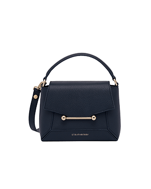 Strathberry Mosaic Nano navy leather bag with top handle, shoulder strap and gold bar detail.