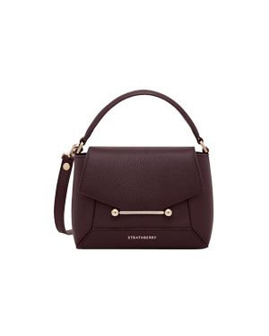 Strathberry Mosaic Nano burgundy top-handle bag with gold bar detail and strap