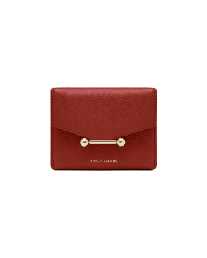 Strathberry Levanto red mosaic trifold wallet with gold bar detail.
