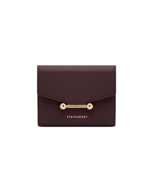 Burgundy Strathberry Mosaic trifold wallet with gold bar closure and logo.