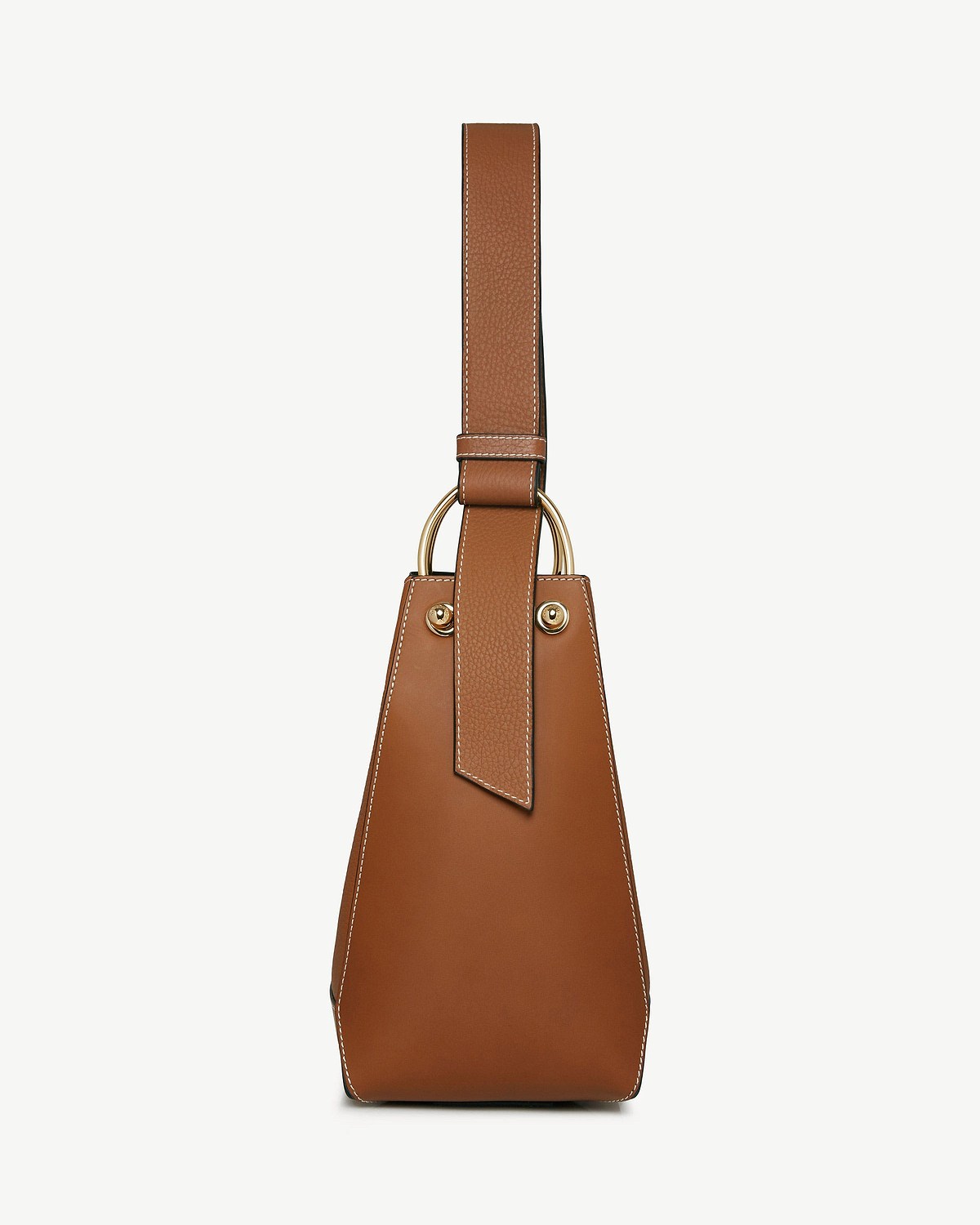 Tan leather midi bucket bag with vanilla stitching, wide strap and gold rings.
