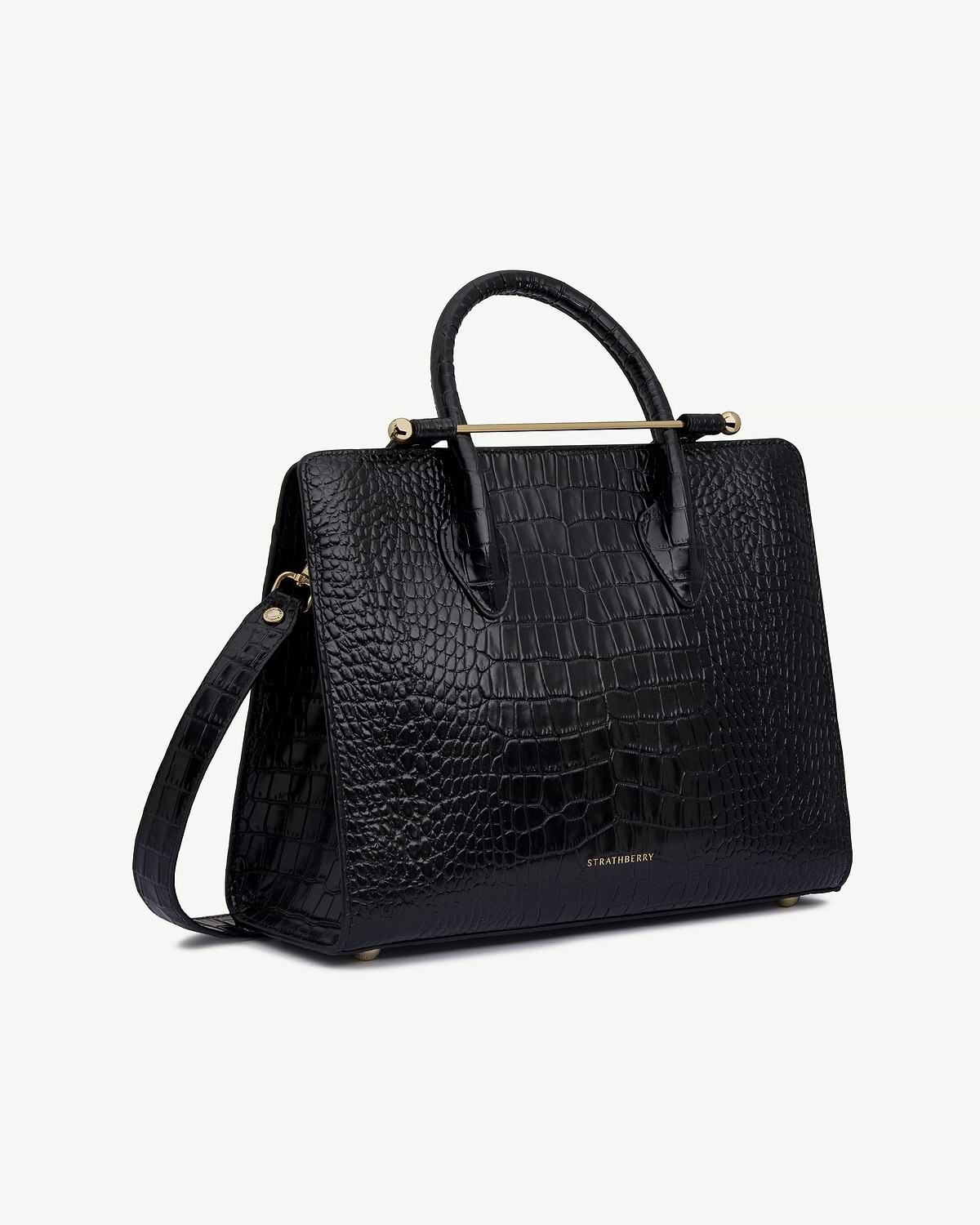 Strathberry black croc midi tote with top handles, shoulder strap, gold bar.