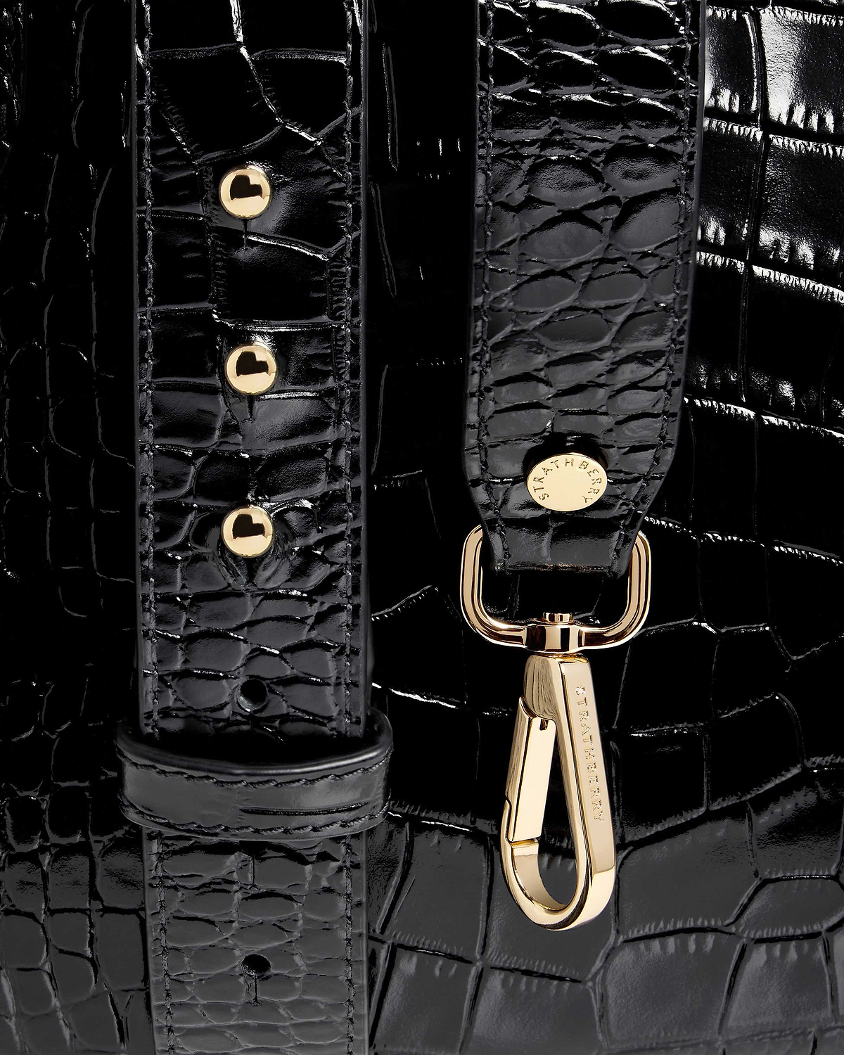 Black croc leather midi tote strap with gold Strathberry clasp and studs.