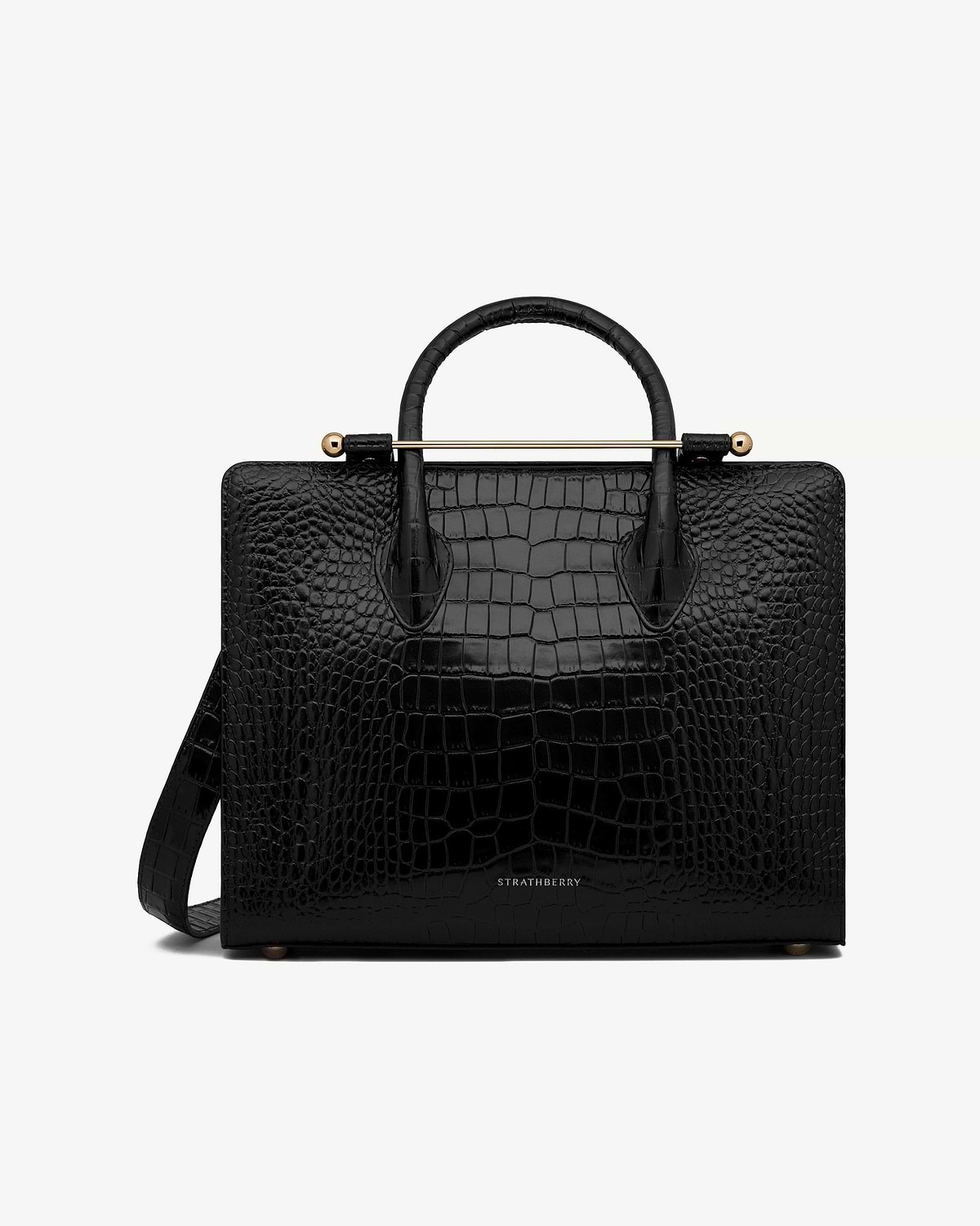 Strathberry midi tote in black croc leather with top handles and shoulder strap.