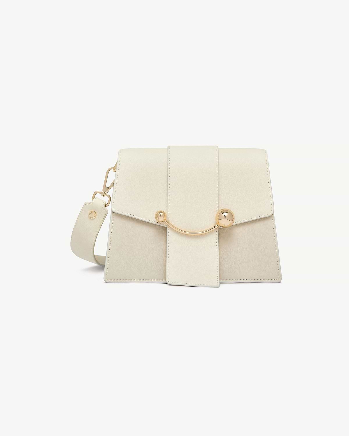 Vanilla box crescent bag with flap, curved gold bar detail and detachable strap.