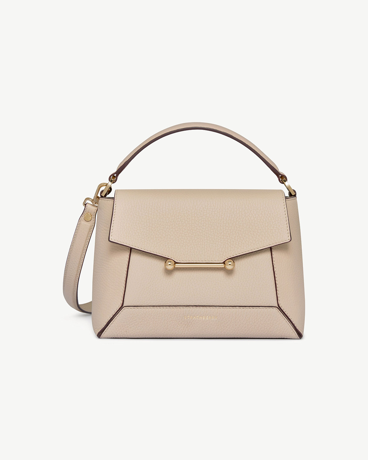 Strathberry Mosaic bag in oat with top handle, shoulder strap, and gold bar hardware.