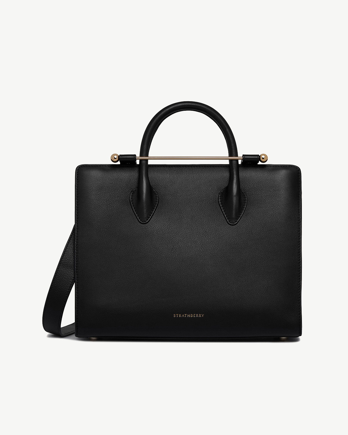 Black Strathberry midi tote with top handles, shoulder strap, and gold bar hardware.