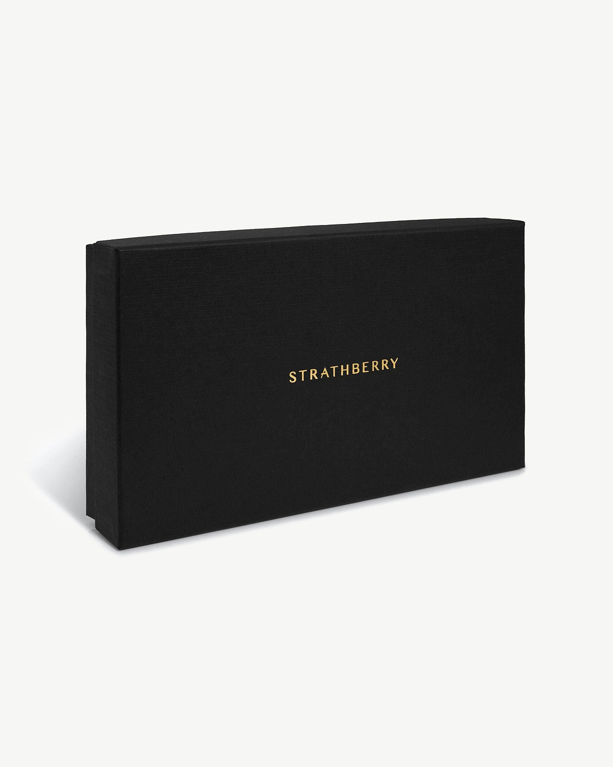 Black textured gift box with gold Strathberry logo on white background.